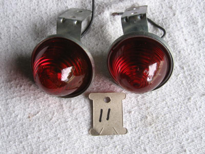 2 red cone shape clearance lights