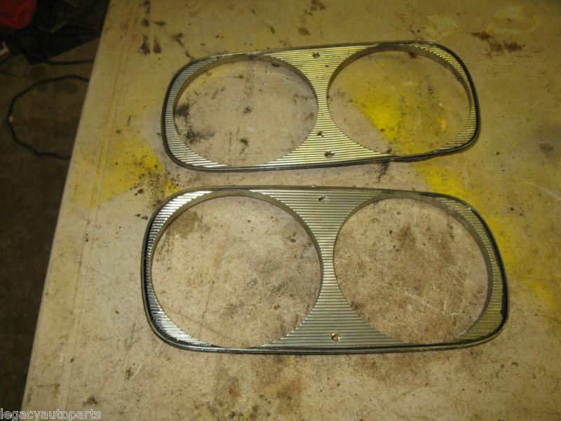 1966 ford thunderbird set of left and right headlight bezels