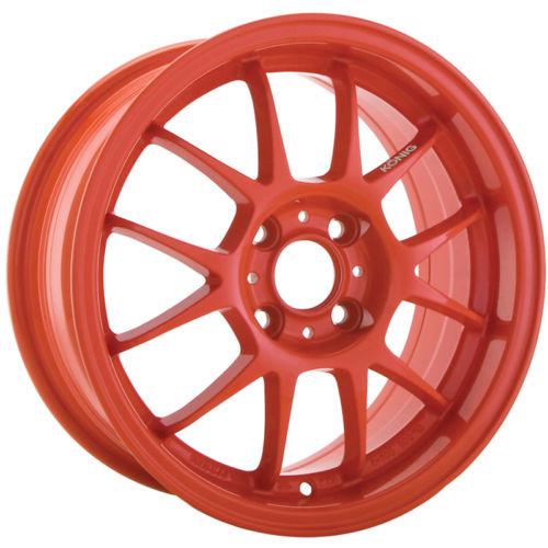 15x6.5 orange konig daylite wheels 4x100 +40 chevrolet geo prizm aveo