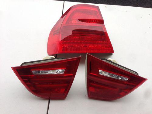 06-09 bmw 328 left and trunk light