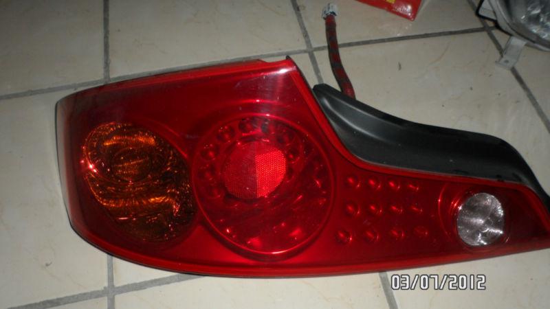 03 04 05 infiniti g35 coupe 2dr left side led tail light oem