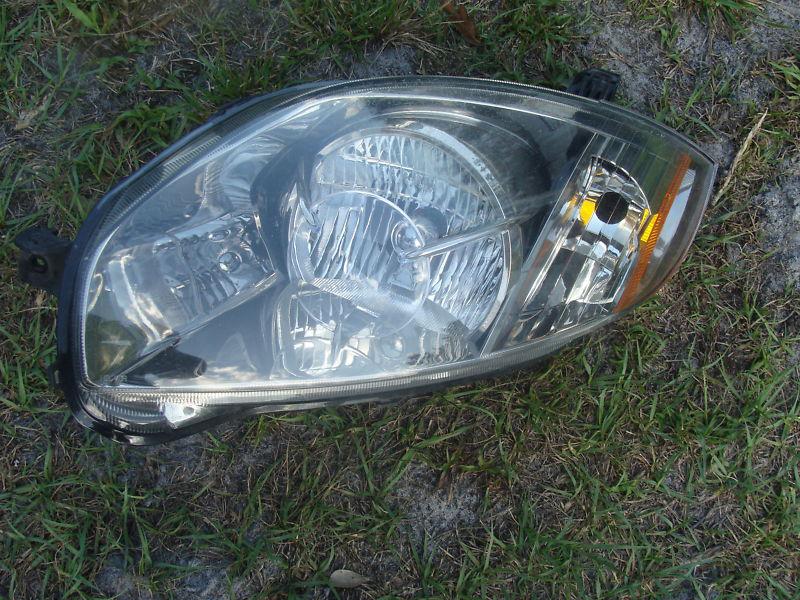 06 07 08 09 2010 2011 mitsubishi eclipse oem left headlight nice