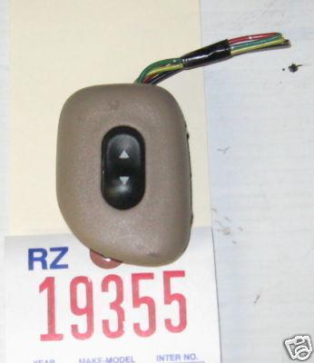 Ford 99 escort window switch panel left rear 1999 tan