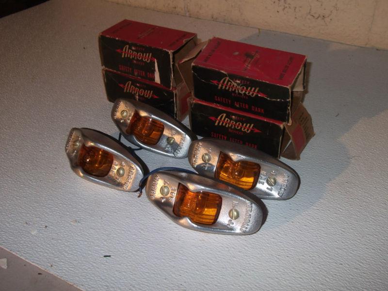 4 new-old-stock vintage "arrow" 47 amber 12 volt side marker lights