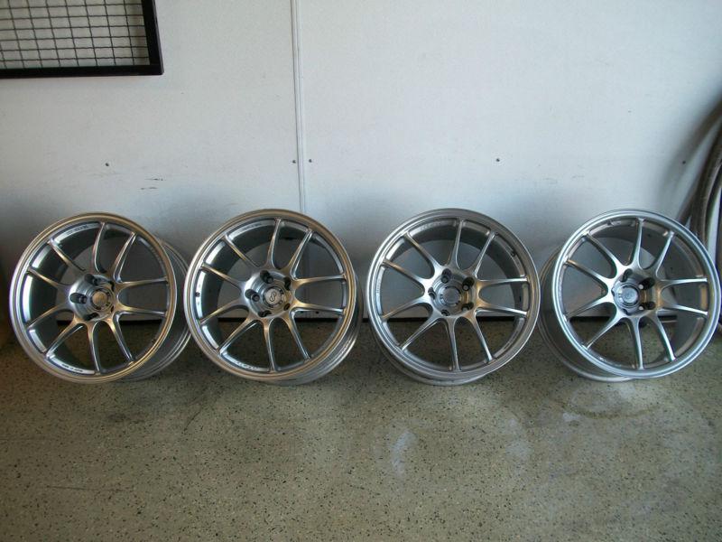 Enkei pf01 18x10.5 5x114.3 38 offset silver