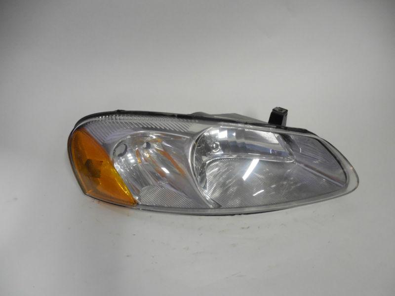 01 02 03 04 05 06 stratus sebring oem right headlight nice! 