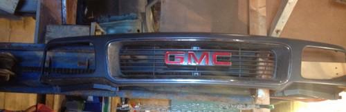 96 gmc jimmy grill headlight bezel assembly