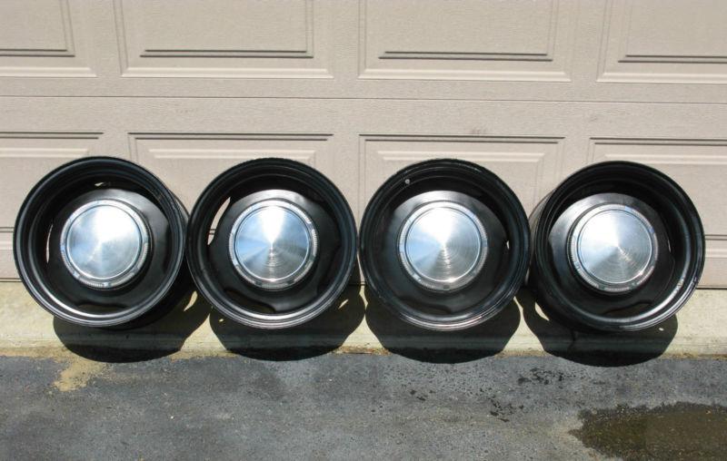 Original mopar steel wheels, 15x8, 5x4.5, 4.25 backspacing, with center caps