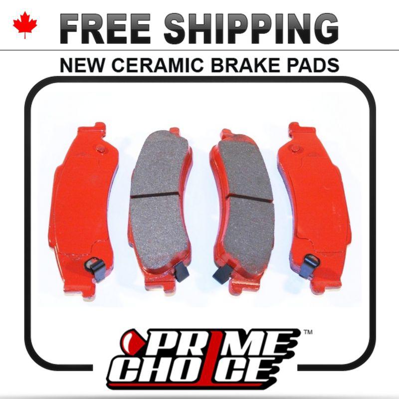 New premium complete set of rear ceramic disc brake pads with shims