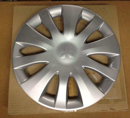 (1) brand new genuine 15" oem wheel cover for 2006-2007 mitsubishi lancer models