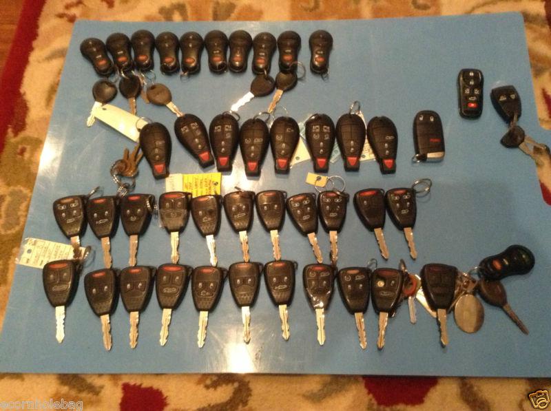 Big lot 44 smart key fobs dodge jeep chrysler etc car truck suv nr!