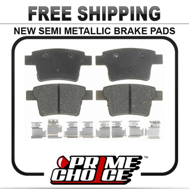 New premium complete set of rear metallic disc brake pads with shims