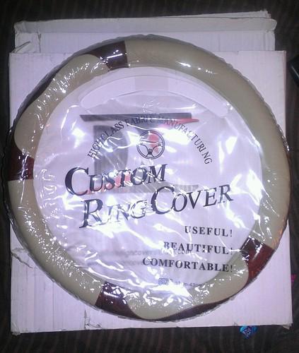 Brand new tan/beige pu steering wheel cover w/darker brown accents, very nice!!