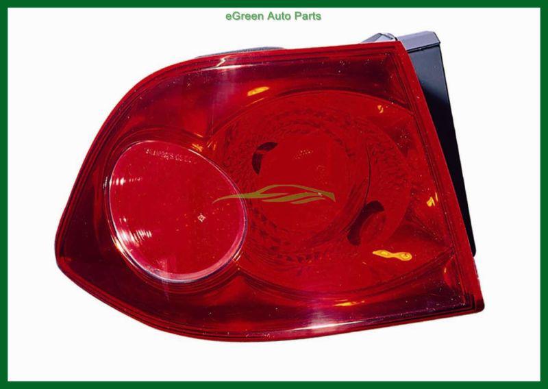 06-08 optima tail light lamp left driver outer