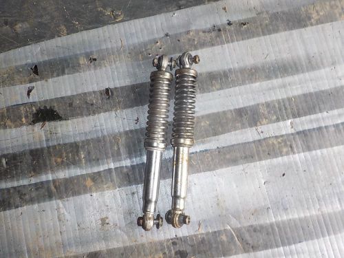 Used:shocks from a manco mini bike.