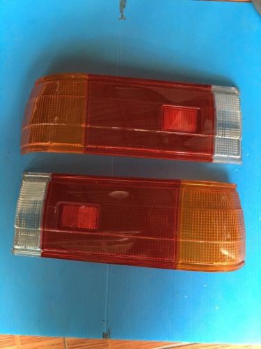 Mazda 323 1.4 tail lights rear lamp cover lens lh+rh genuine nos japan