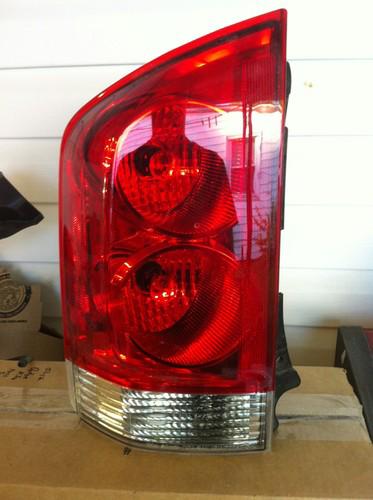 Nissan armada drivers left tail light