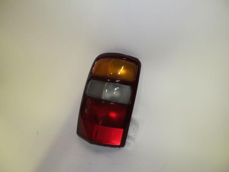 00 01 02 03 chevrolet tahoe suburban oem left tail light nice!