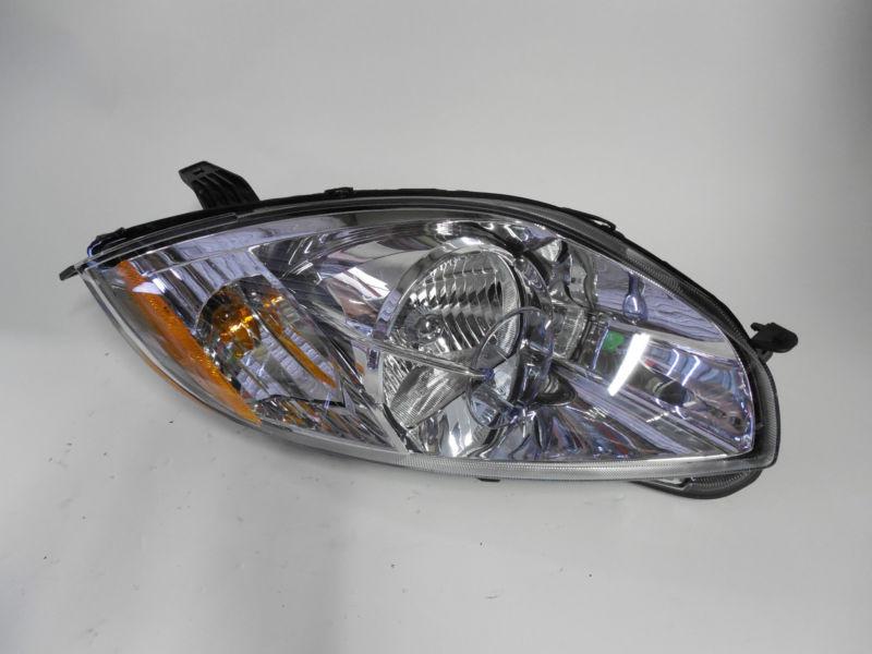 06 07 08 09 2010 2011 mitsubishi eclipse oem right headlight brand new!