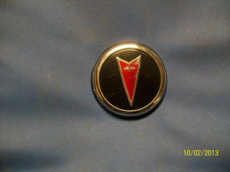 Pontiac trunk lock cover,emblem,ornament bonneville hidden key lock cover. nice!