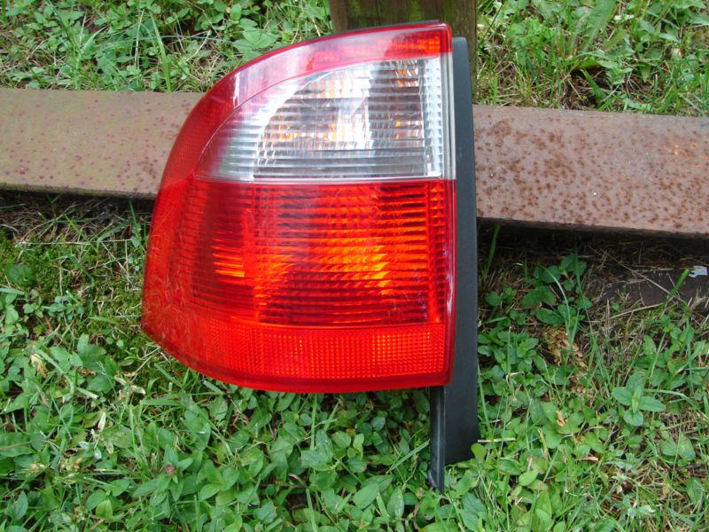 2002 03 04 05 saab 9-5 station wagon tail light lh sw corner qtr mtd