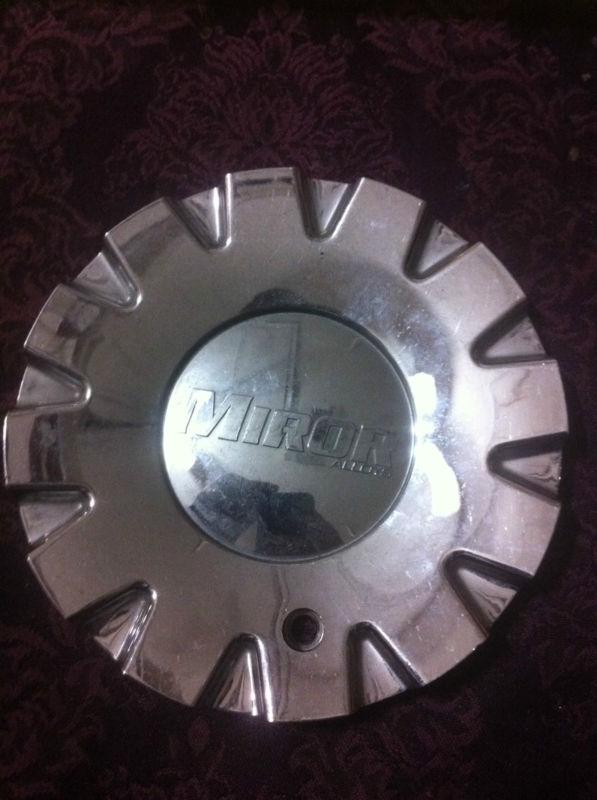 1 miror alloys wheels chrome center cap  part# cap409l156  stock# 203