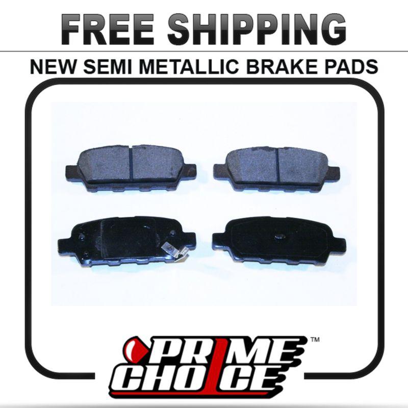 New premium complete set of rear metallic disc brake pads with shims