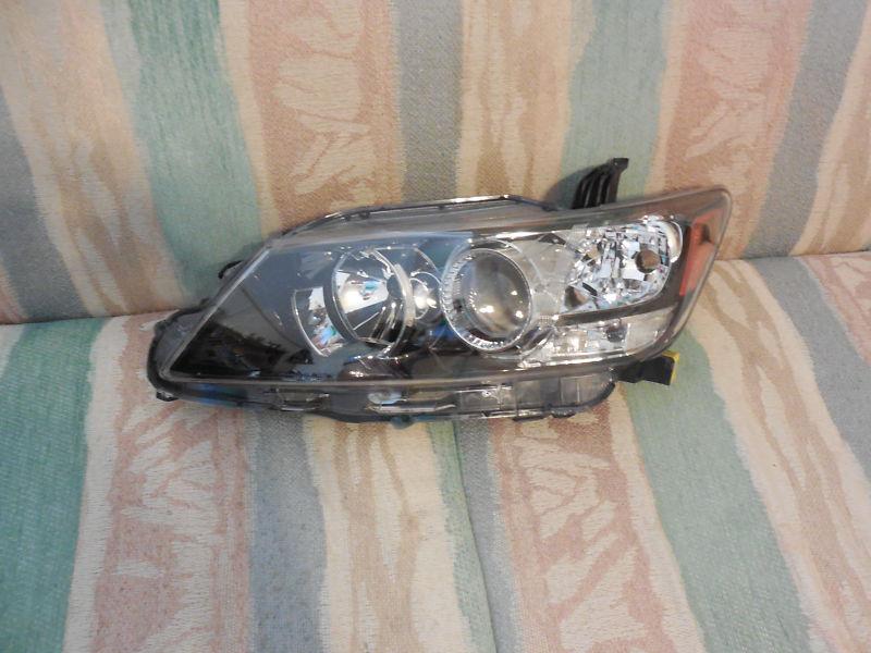 Scion composite headlamp driver side 81170-21200 (st)