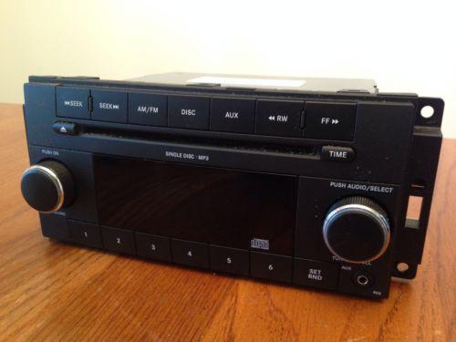 Chrysler jeep factory oem cd player mp3 radio p68021157ae 2009 10 11 works