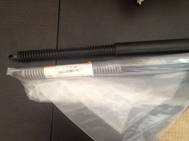 Bmw e65 e66 set of left and right trunk shocks with springs genuine