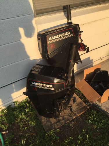 Lot of 2 gamefisher 15 hp outboard motor with gas tank and fitting.