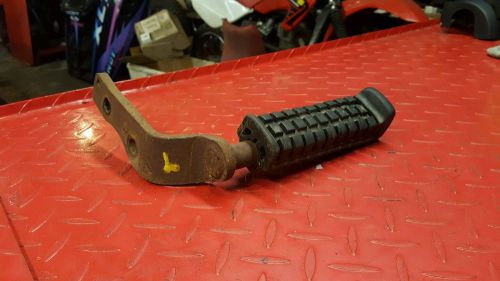 1987 honda trx 125 left side foot peg assembly