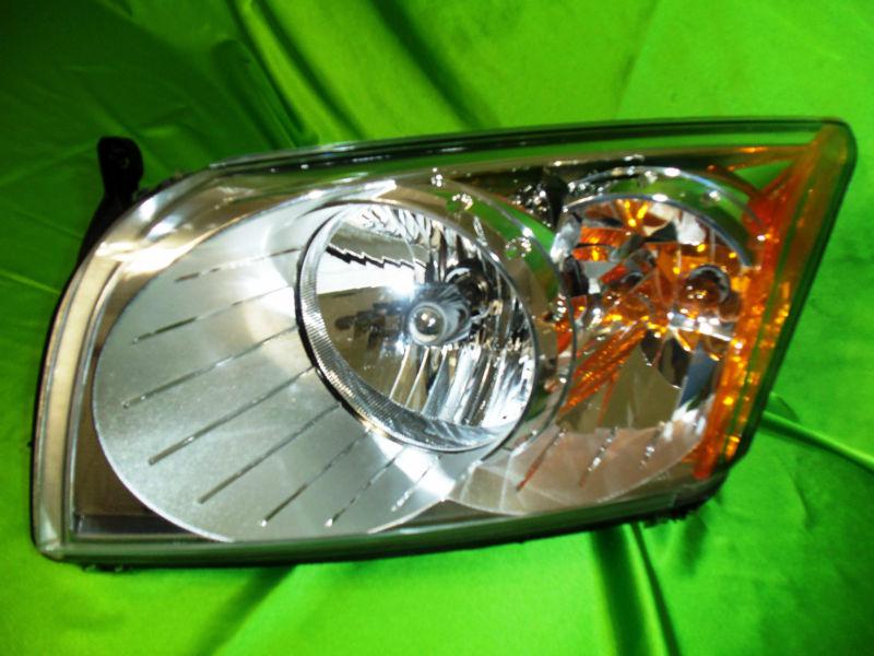  07 08 09 10 11 caliber left oem halogen headlight excellent with warranty h6-70