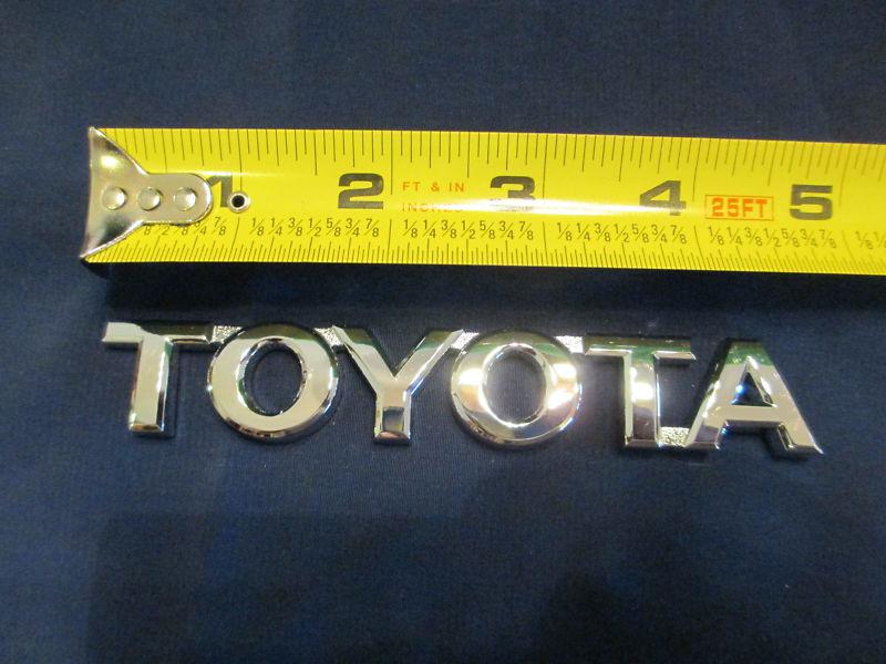 Chrome "toyota" emblem