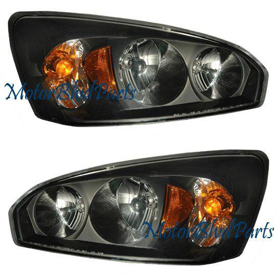 04-07 malibu /malibu maxx black headlamps headlights