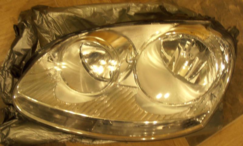 Genuine vw jetta left drivers headlight 1k6 941 005 s 05-10 06 07 08 09 used 