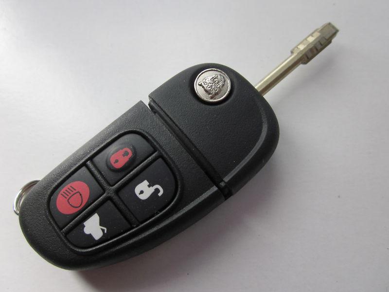 Used oem jaguar flip key keyless remote fob cwtwb1u243