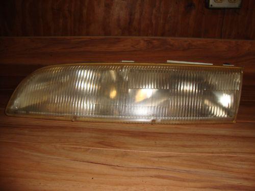 1993 ford crown victoria passenger side head light oem