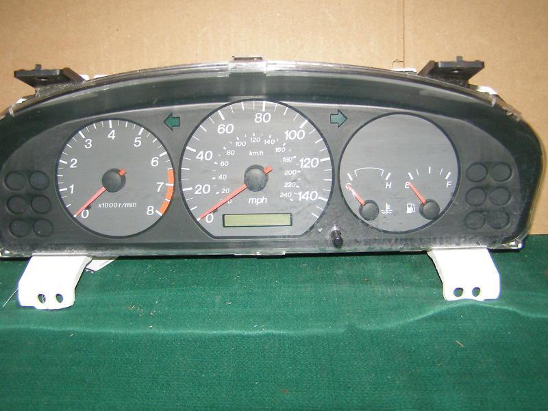 2001 2002 mazda 626 speedometer cluster  136k  4 cyl  w/o daytime running lights