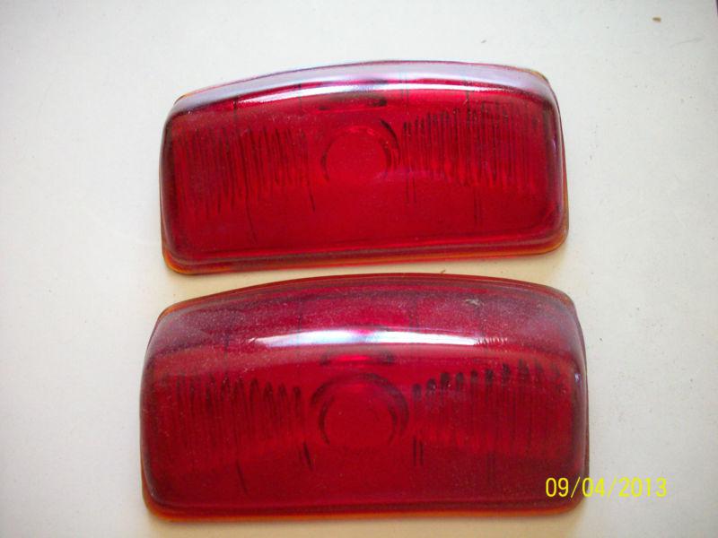 A pair of nos tail lens  for a 1942 plymouth  