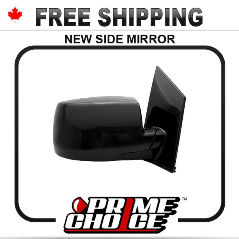 New power heated passengers side door mirror