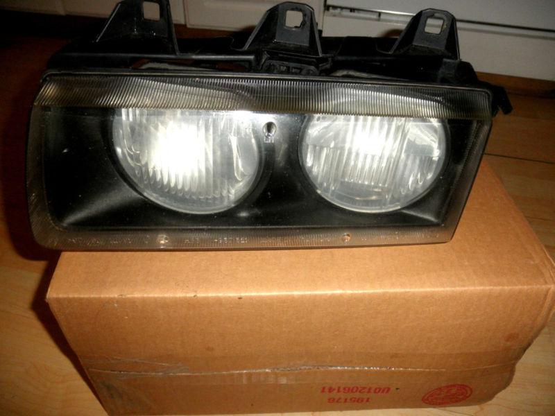 Bmw 3 series halogen headlamp, left 318 320 323 325 328 m4 hella oem 63121387861