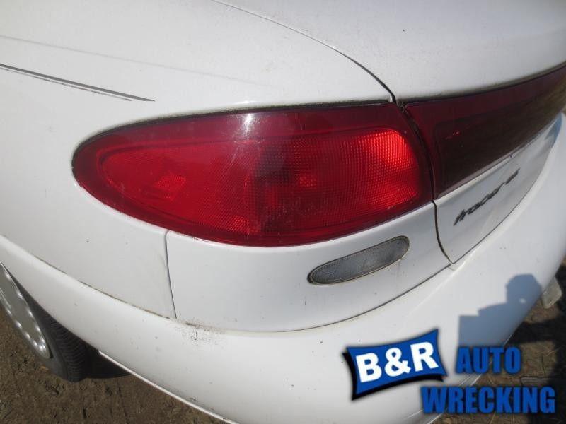 Left taillight for 97 98 escort ~ sdn   back-up lamp in filler panel 4729285