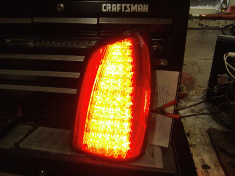 2000,2001,2002,2003,2004,2005  cadillac deville r/h brake light assembly tested!