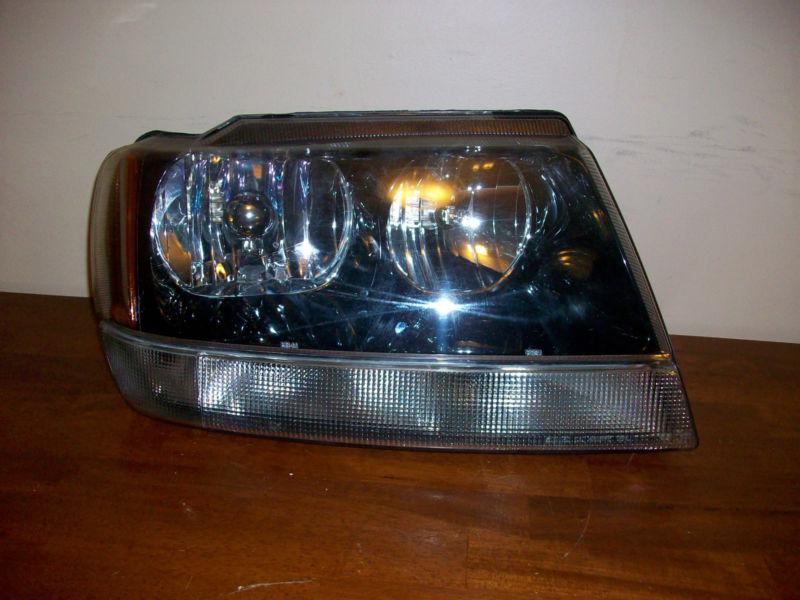 Jeep grand cherokee 1999-2004 righthand side headlight 99 00 01 02 03 04