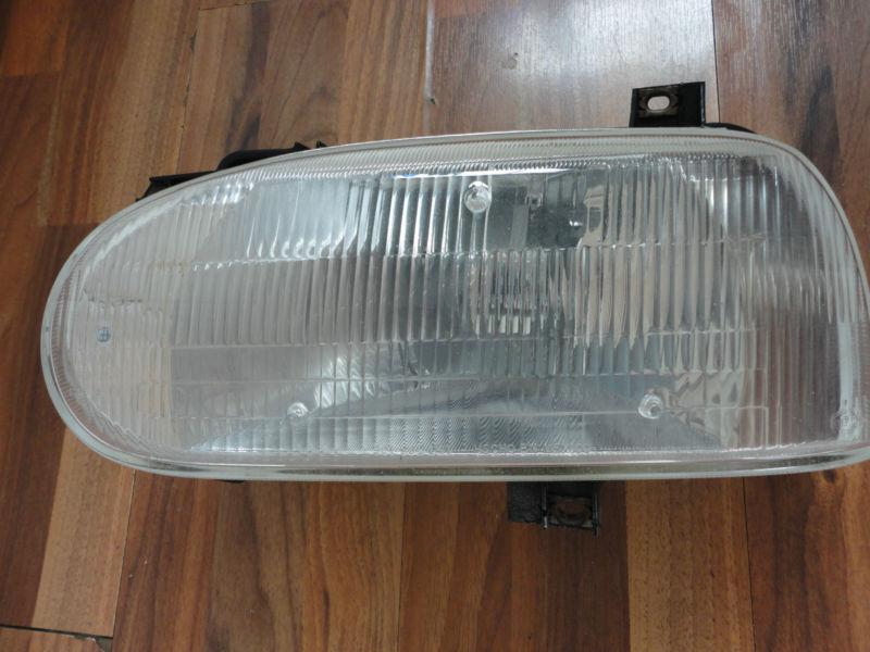 Vw golf hella  301 962 041 left or driver headlight