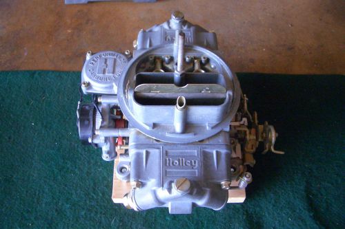 Holley carburetor single pump.