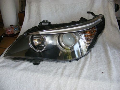 Bmw 528 left halogen headlight w mount plate oem 08-10