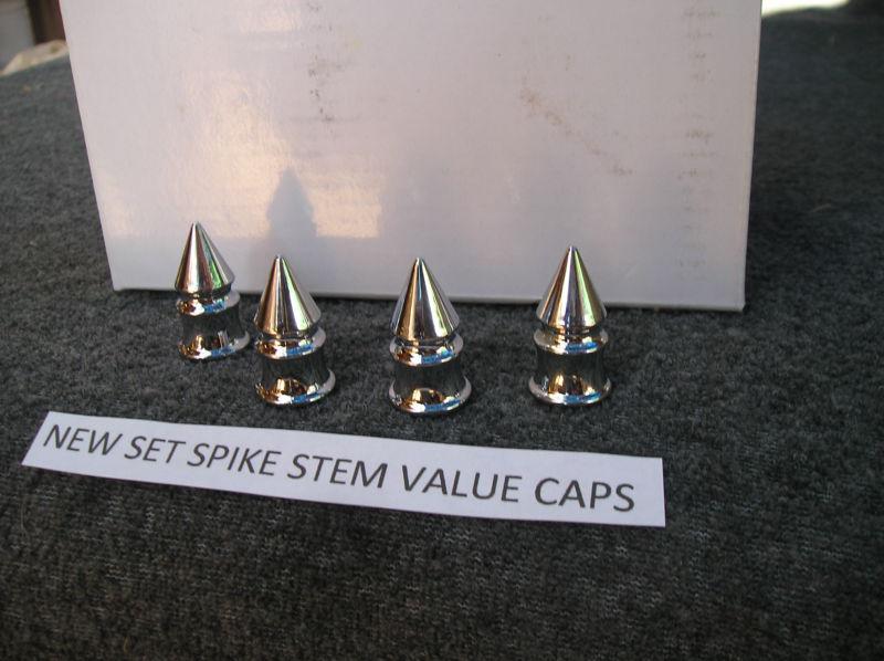 New car truck bike set of 4 chrome spike tire stem caps ! 