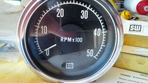 Stewart warner electronic 5000 rpm tachometer.#d-994-f